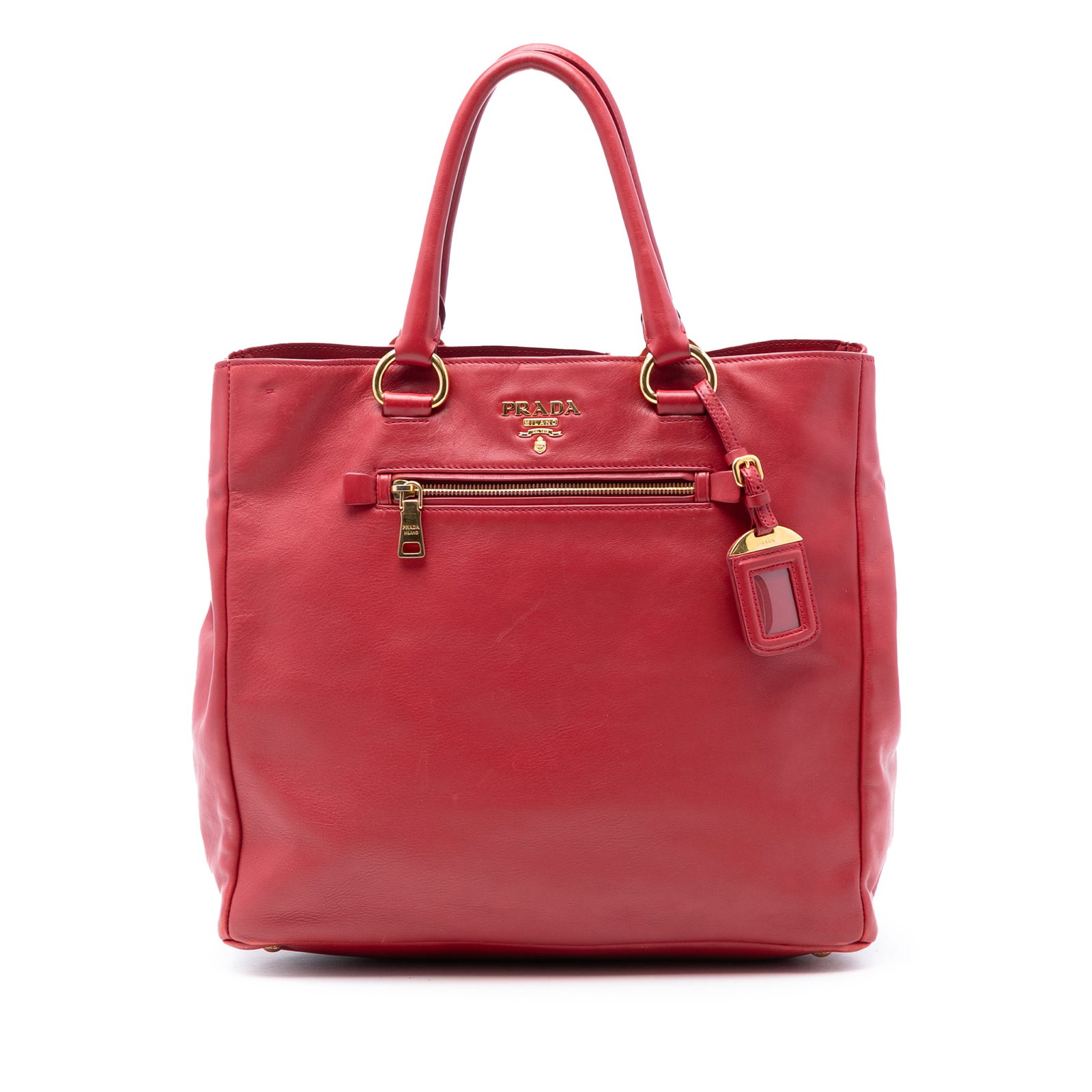 Prada Vitello Daino Red Leather Convertible Satchel Tote Italy: Prada Vitello Daino Red Leather Convertible Satchel Tote Italy This Prada Vitello Daino Open Convertible Tote is crafted in red leather and features rolled leather handles, an open top with a magnetic