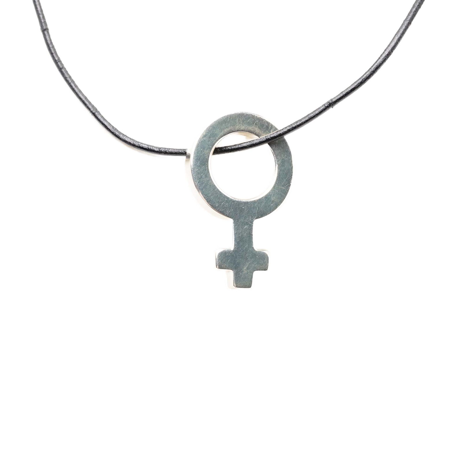 Gucci Venus Symbol Pendant Necklace in Leather and Sterling Silver: Gucci Venus Symbol Pendant Necklace in Leather and Sterling Silver Gucci Venus Symbol pendant necklace featuring a leather cord and sterling silver pendant with a bayonet clasp closure. Made in Italy,
