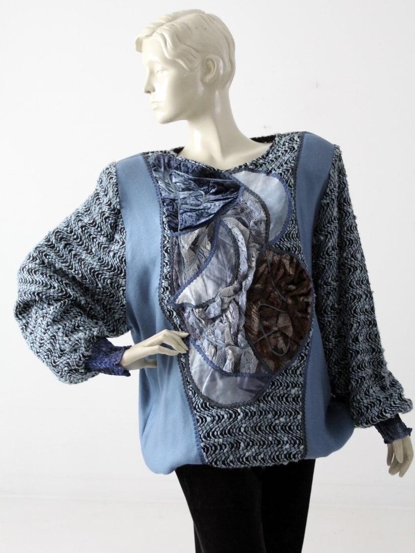 1980s Vintage Patchwork Blouse Blue Rayon Oversized Velvet Lace: 1980s Vintage Patchwork Blouse Blue Rayon Oversized Velvet Lace Embrace vintage style with this stunning 1980s patchwork blouse. Crafted from soft blue rayon, this oversized top features beautifully w