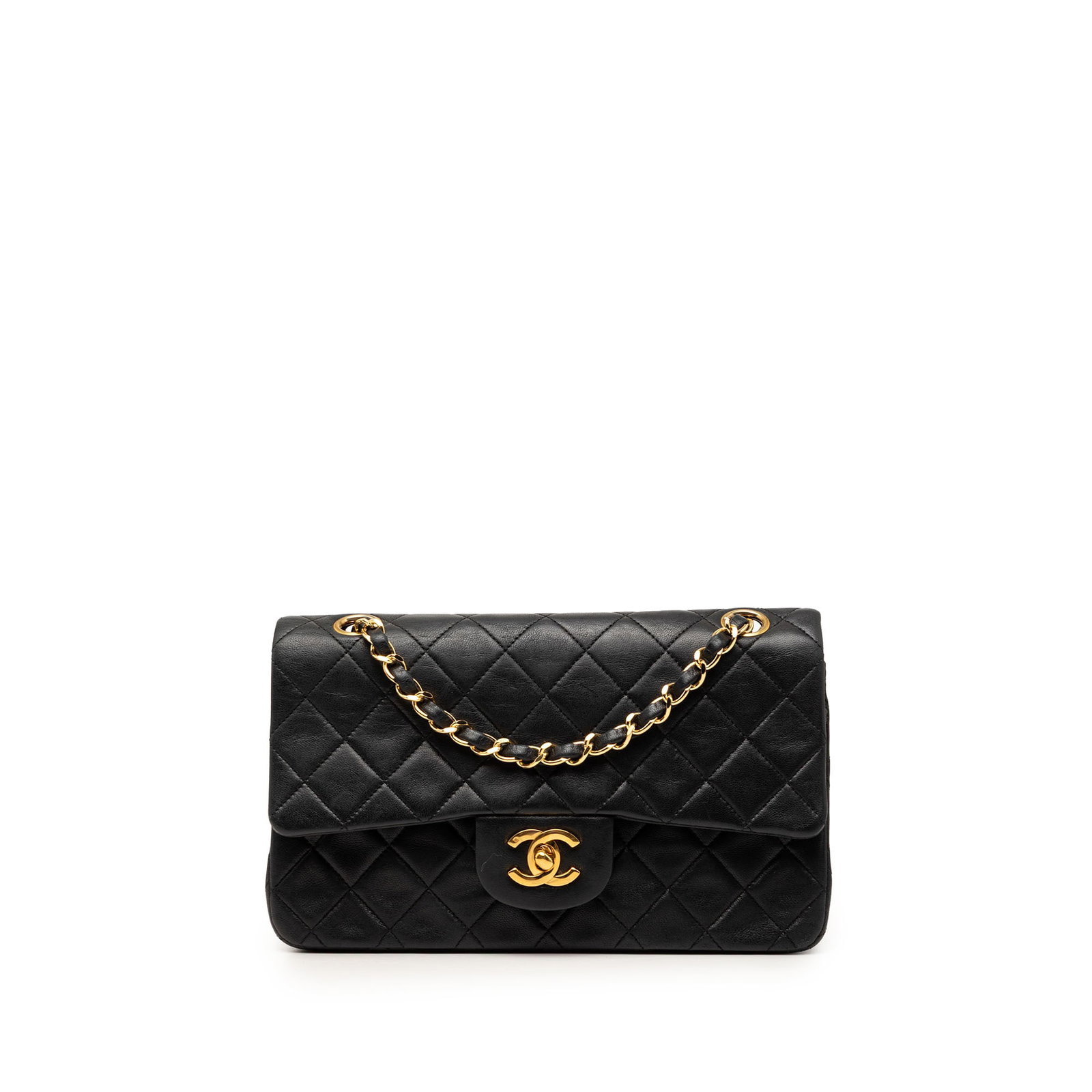 Chanel Small Classic Double Flap Shoulder Bag in Black Lambskin: Chanel Small Classic Double Flap Shoulder Bag in Black Lambskin Chanel Small Classic Lambskin Double Flap shoulder bag in black quilted lambskin leather. This bag features leather-woven chain shoulder