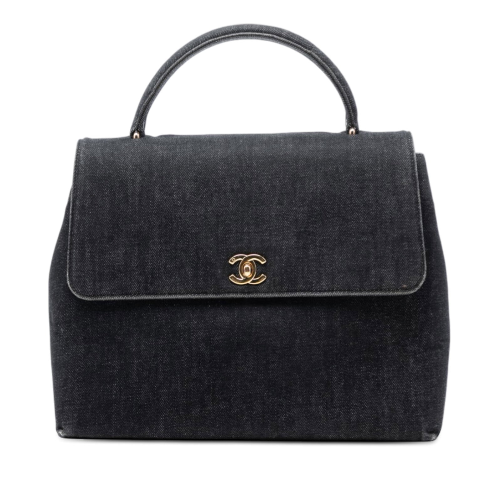 Chanel Denim CC Top Handle Kelly Style Handbag: Chanel Denim CC Top Handle Kelly Style Handbag This Chanel CC Denim Kelly Top Handle Bag features a denim body, a rolled top handle, a top flap with a CC turn lock closure, an exterior back slip pocke
