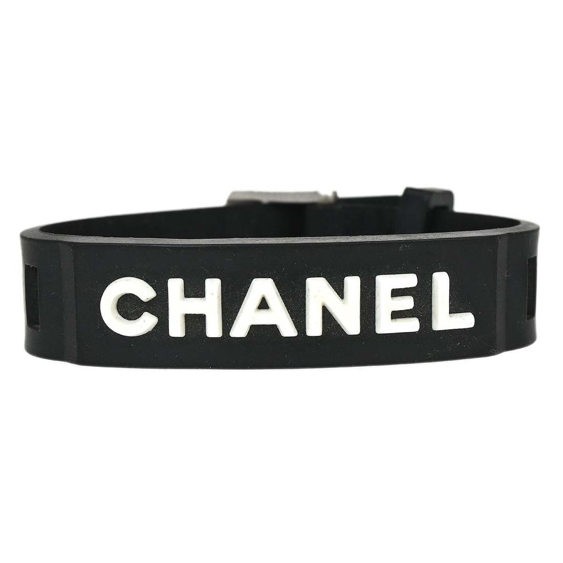 Chanel 99P black rubber bracelet with box: Chanel 99P black rubber bracelet with box Chanel bracelet in black rubber, made in France. It is described as being in good condition with dirt noted on the exterior. The bracelet comes with its box. 