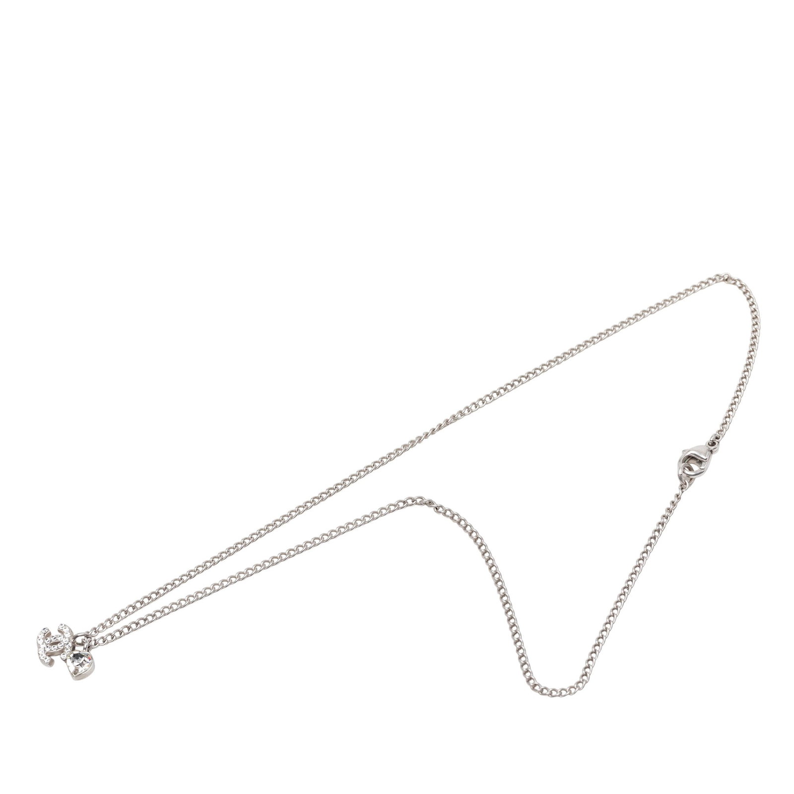 Chanel CC Heart Pendant Necklace Silver Tone Crystal Accents: Chanel CC Heart Pendant Necklace Silver Tone Crystal Accents Chanel CC Brass Strass Crystal Heart Pendant Necklace in silver tone, featuring crystal-embellished pendants, a silver-tone chain, and a lo