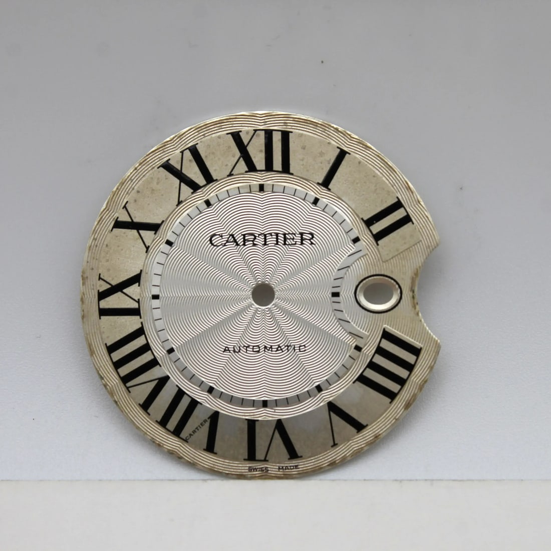 Cartier Ballon Bleu 32.5MM Luxury Silver Watch Dial Roman Numerals: Cartier Ballon Bleu 32.5MM Luxury Silver Watch Dial Roman Numerals This pre-owned Cartier Ballon Bleu watch dial features a luxurious silver color with Roman numerals, showcasing the elegant design sy