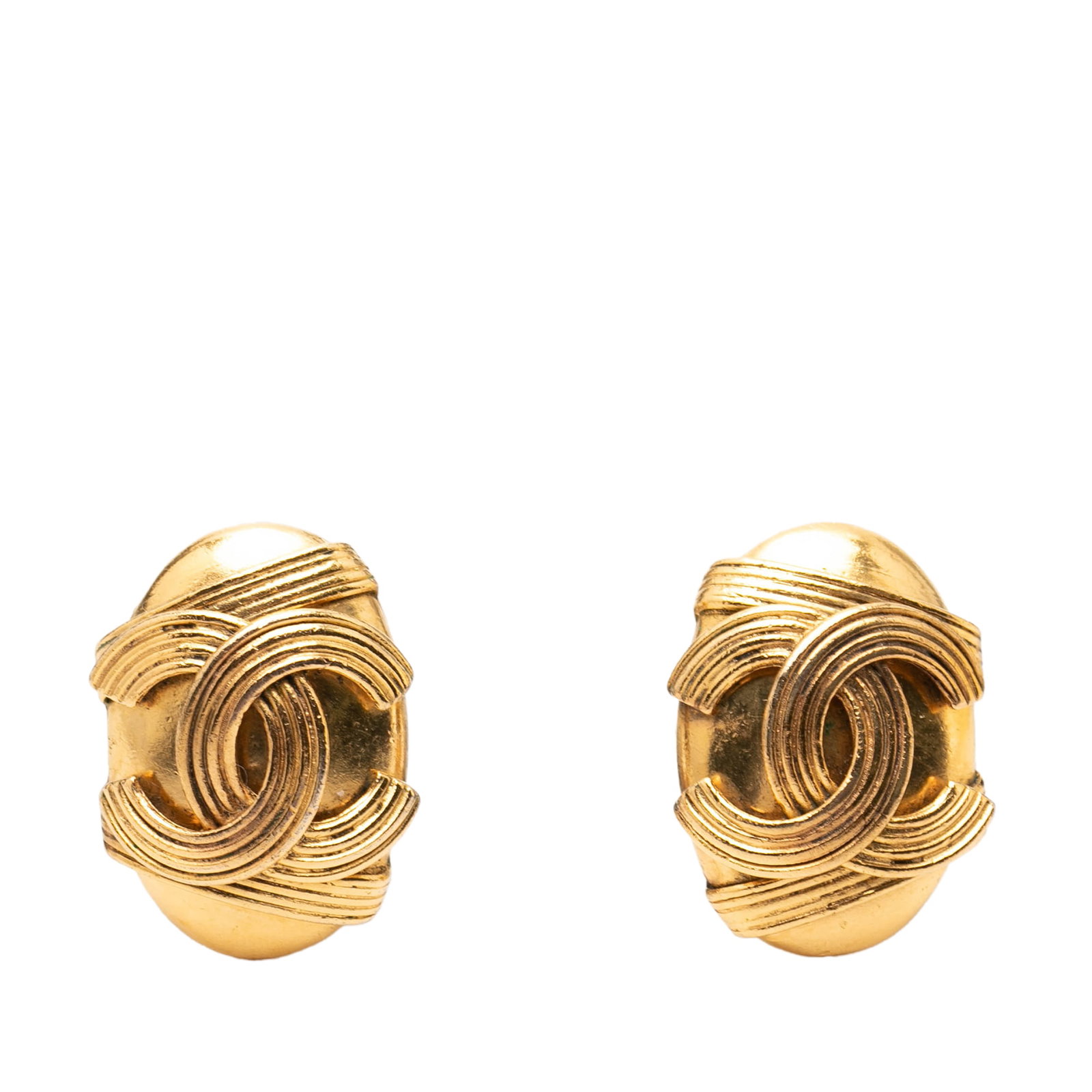 Chanel CC Gold Plated Oval Clip Earrings: Chanel CC Gold Plated Oval Clip Earrings These Chanel CC gold-plated oval earrings feature a classic clip-on closure and are crafted from metal with a gold-plated finish. Made in France, these costume