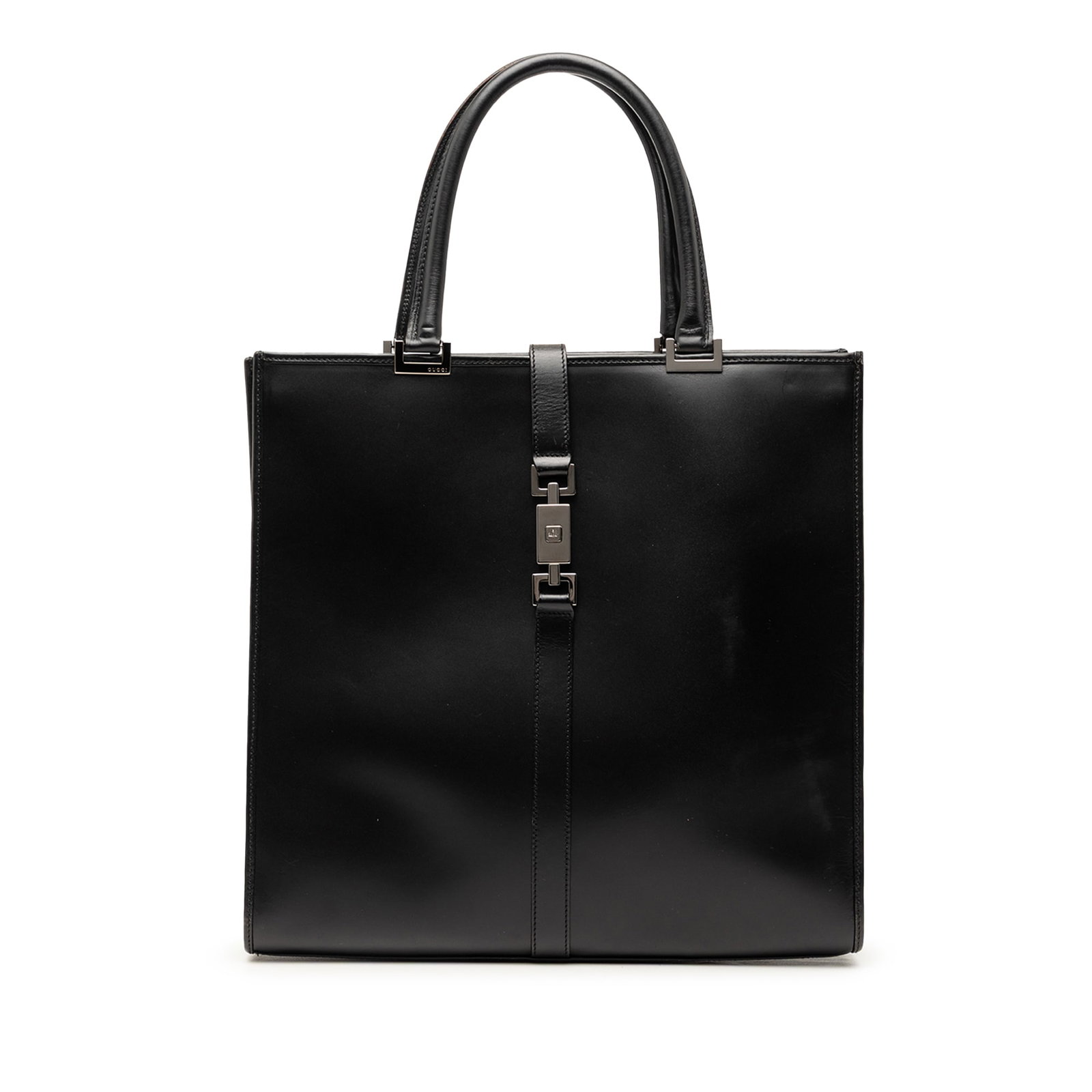 Gucci Jackie Calfskin Leather Tote Bag Black: Gucci Jackie Calfskin Leather Tote Bag Black Gucci Calfskin Jackie Tote in black, made in Italy. This bag features a leather body, rolled leather handles, an open top with strap and metal closure, and