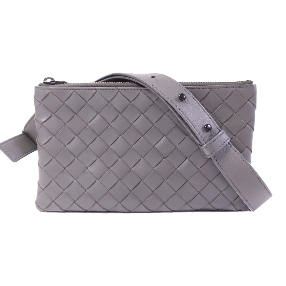 Gray Calfskin Shoulder Bag BOTTEGA VENETA BV: Gray Calfskin Shoulder Bag BOTTEGA VENETA BV Bottega Veneta BV shoulder bag crafted from calfskin (cowhide) leather in gray. It features a shoulder strap measuring 98 to 106 cm and includes two zip po