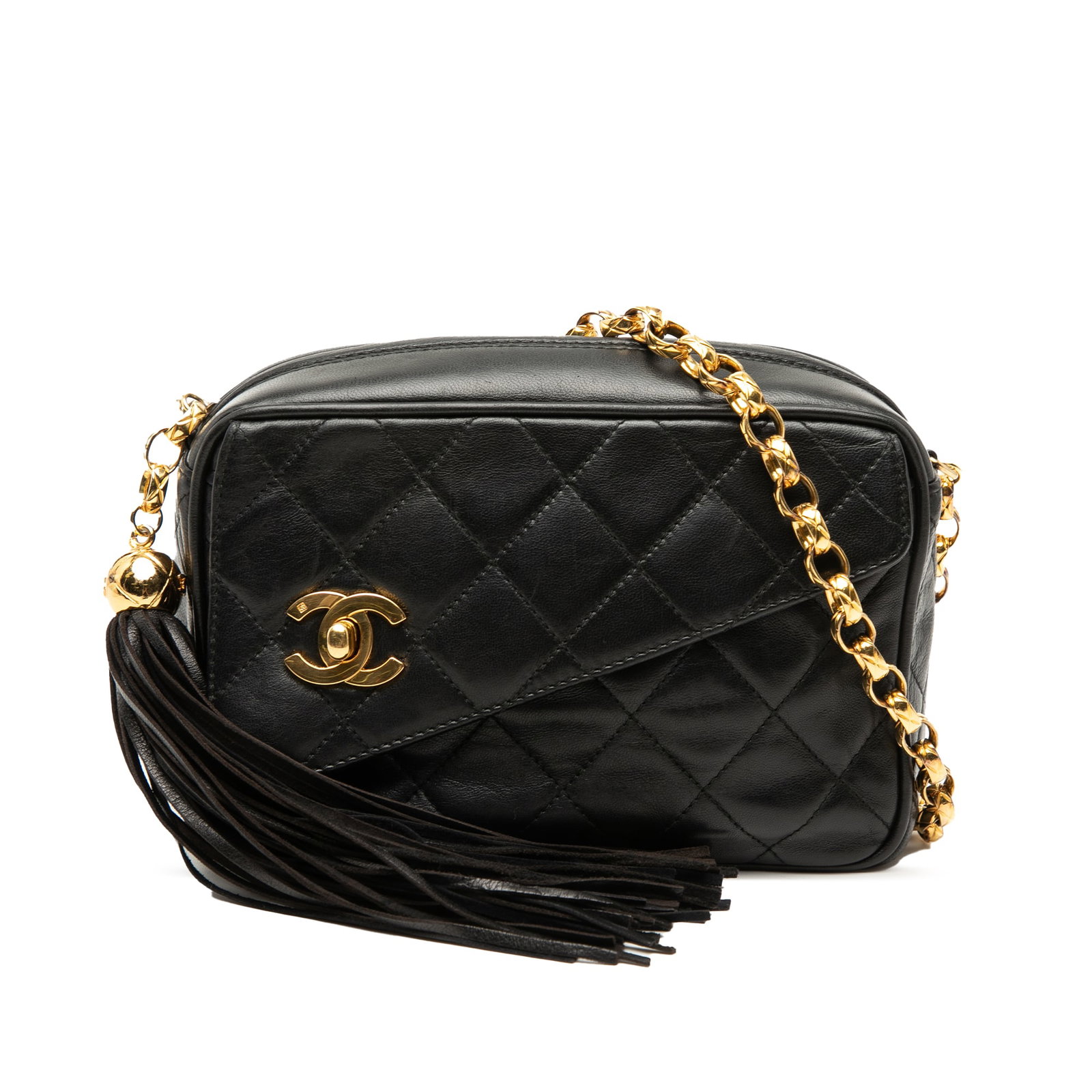Black Chanel Mini Lambskin Camera Bag with Tassel and Chain Strap: Black Chanel Mini Lambskin Camera Bag with Tassel and Chain Strap This Chanel Mini CC Quilted Lambskin Tassel Camera Bag features a black quilted lambskin leather exterior, a gold-tone chain link stra