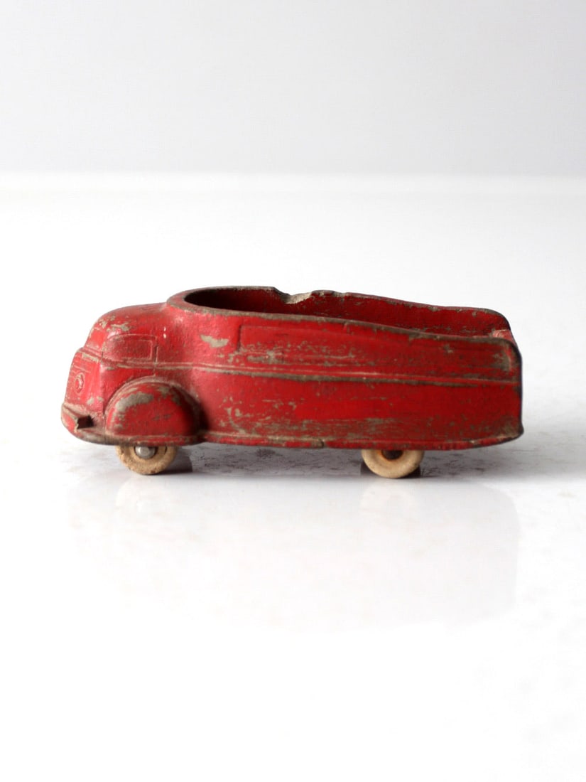 1930s Vintage Sun Rubber Toy Truck Red Collectible: 1930s Vintage Sun Rubber Toy Truck Red Collectible This Vintage 1930s Sun Rubber toy truck is a delightful example of early 20th century American collectibles. Crafted in a vibrant bright red, this ch