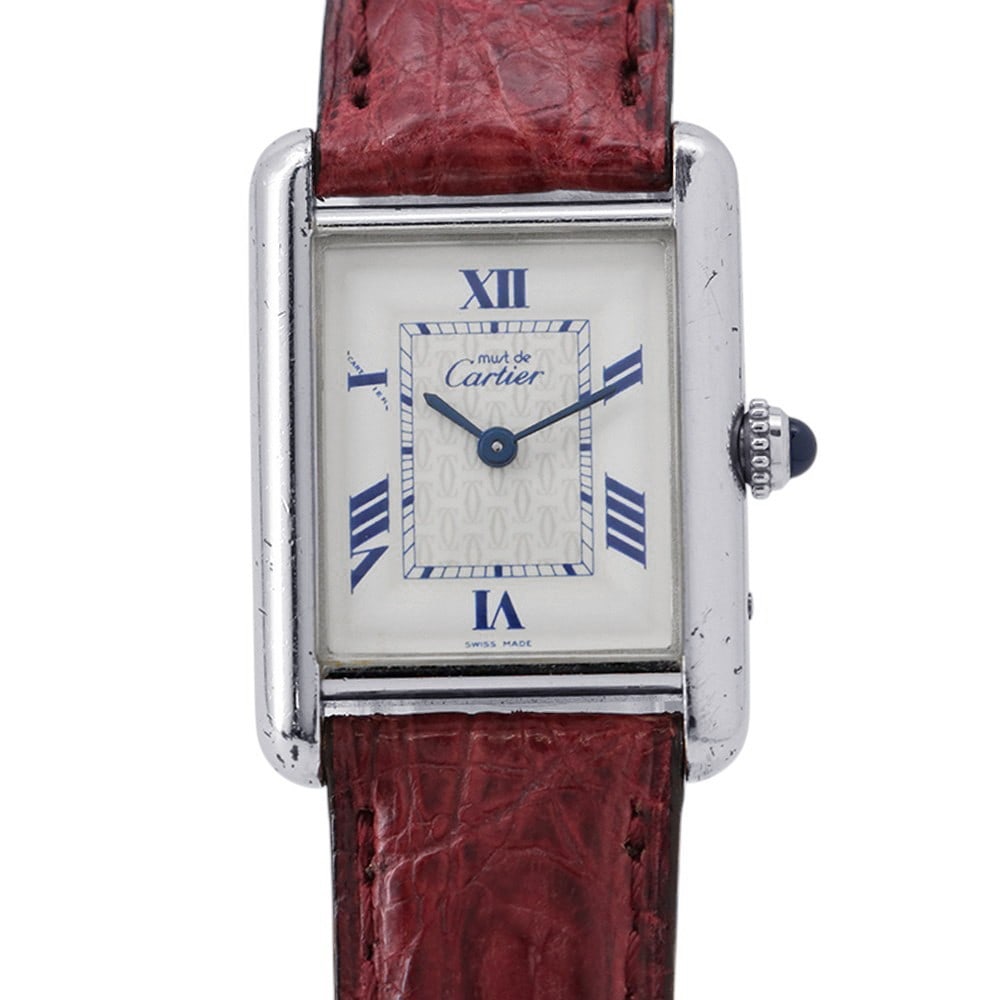 Cartier Must Tank MM 2416 quartz wristwatch white dial SV925: Cartier Must Tank MM 2416 quartz wristwatch white dial SV925 Cartier Must Tank MM 2416 is a pre-owned vintage quartz wristwatch with a white dial and a unisex design. It is made in Switzerland and fea