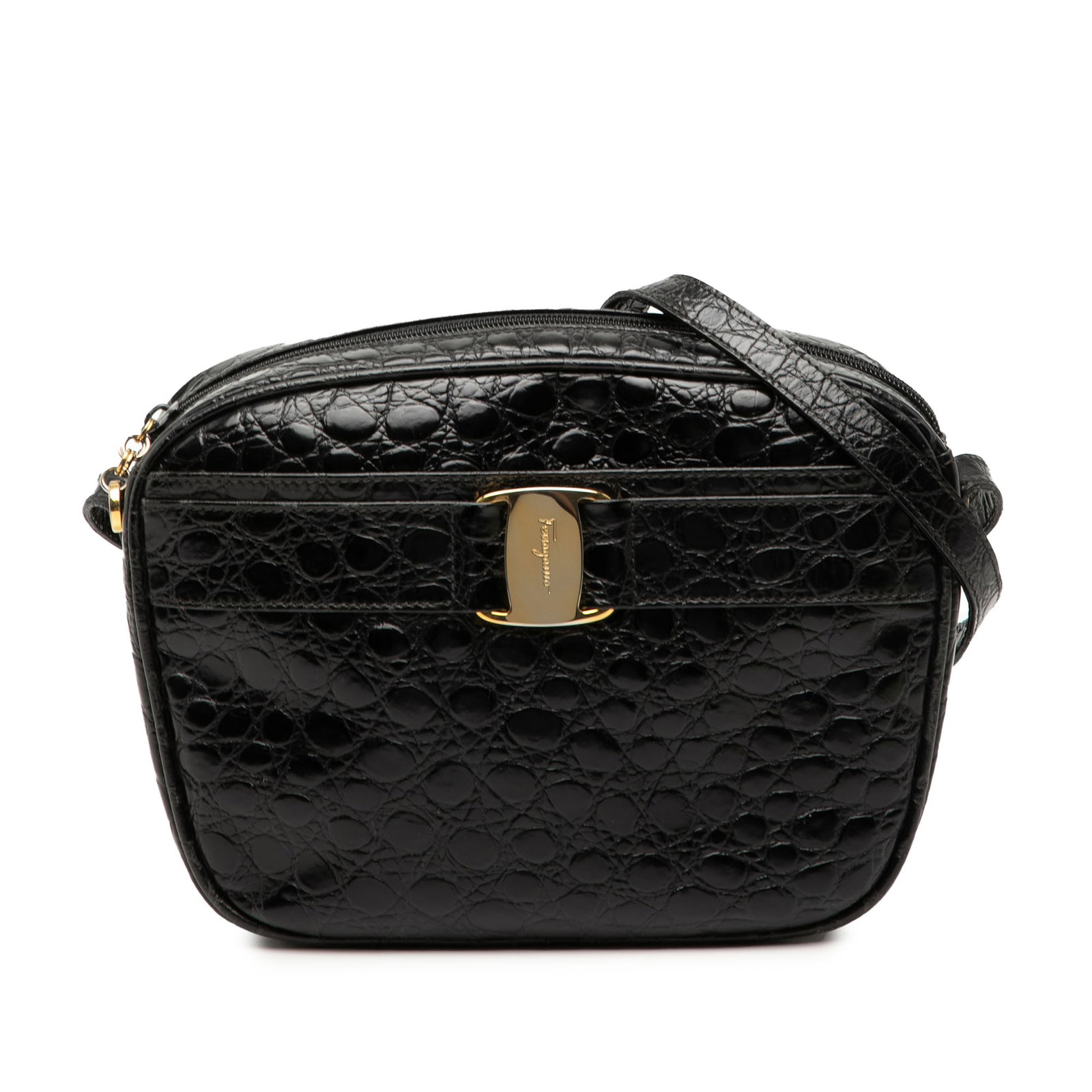 Black Leather Vara Crossbody Bag with Croc Embossed Pattern by Ferragamo: Black Leather Vara Crossbody Bag with Croc Embossed Pattern by Ferragamo This Ferragamo crossbody bag showcases a croc-embossed leather exterior in black, complemented by an adjustable flat leather sh