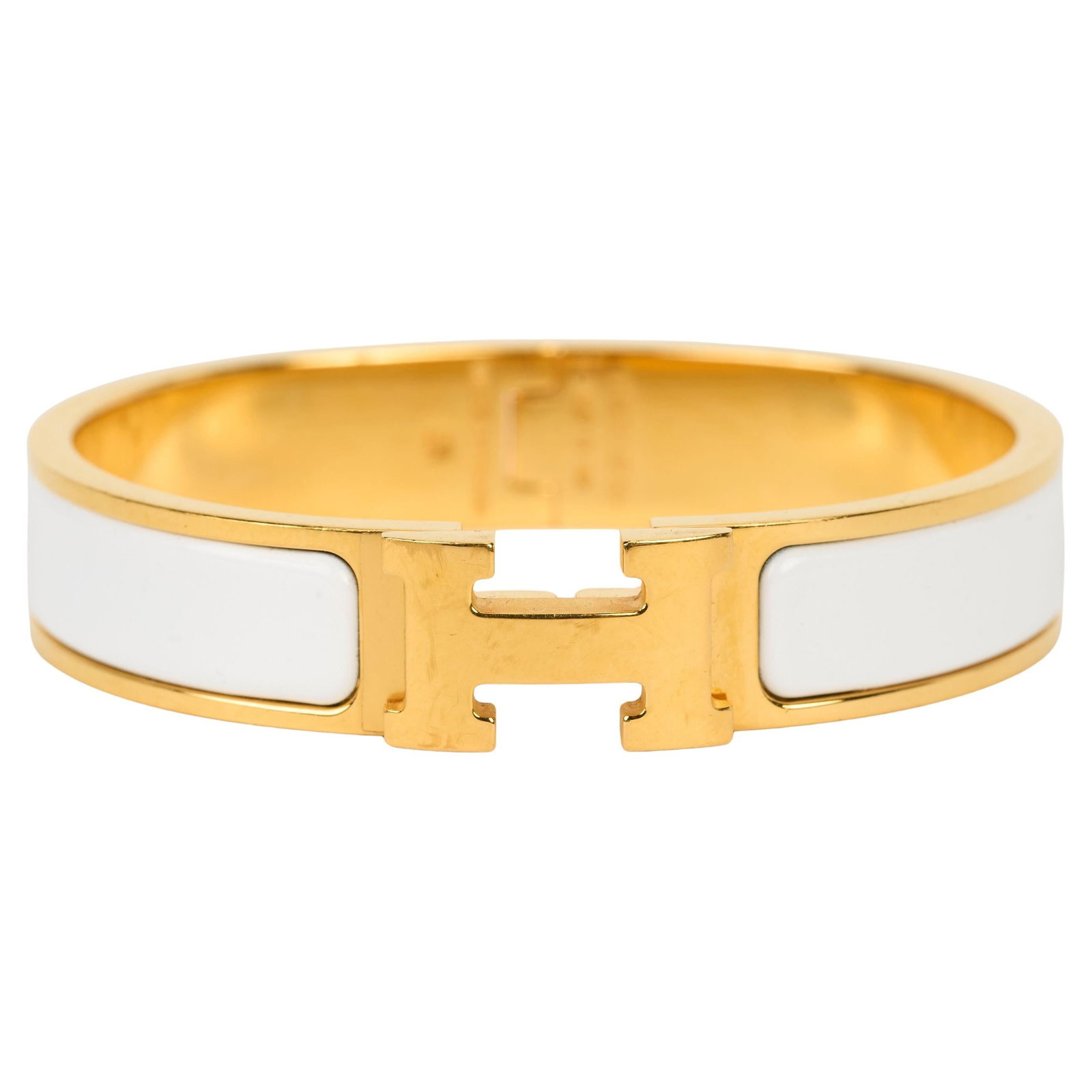 Hermes Clic H Narrow Enamel Bangle Bracelet PM: Hermes Clic H Narrow Enamel Bangle Bracelet PM Hermes Thin Clic Clac H enamel bracelet in a narrow bangle style, finished in white enamel with yellow gold. This 21st-century piece comes with its origi