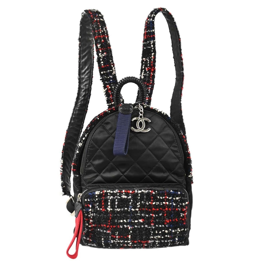 CHANEL Matelasse Tweed Nylon Backpack Black Flap Turnlock: CHANEL Matelasse Tweed Nylon Backpack Black Flap Turnlock Black Chanel backpack in tweed and nylon with a matelasse quilted design, flap turn-lock and drawstring closure, leather lining, and chain adj