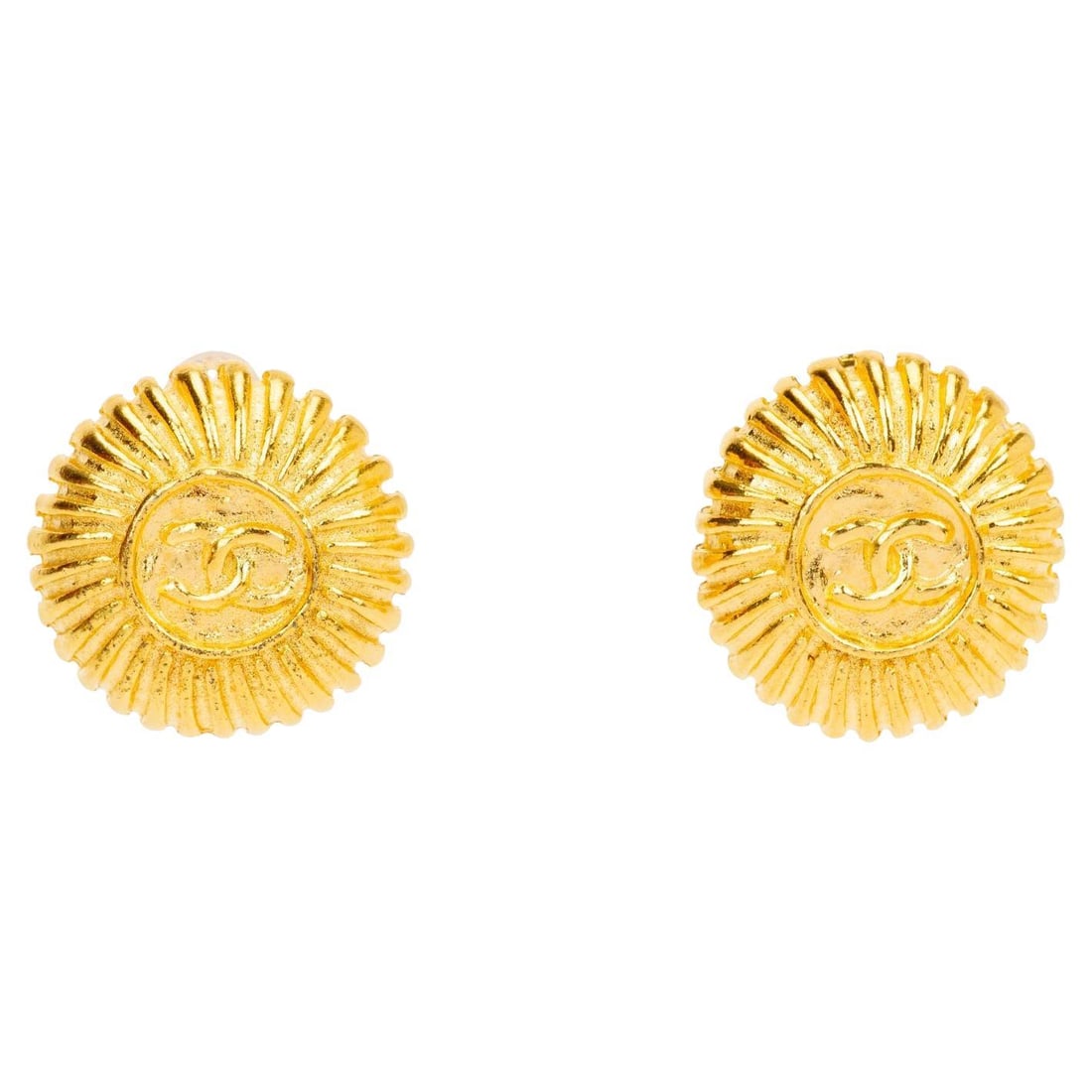 Chanel CC Logo Clip-On Button Earrings Gold Plate 1970s: Chanel CC Logo Clip-On Button Earrings Gold Plate 1970s Vintage Chanel clip-on earrings from the 1970s featuring the CC logo on a round button design with a ribbed gold-plated metal finish. These earr