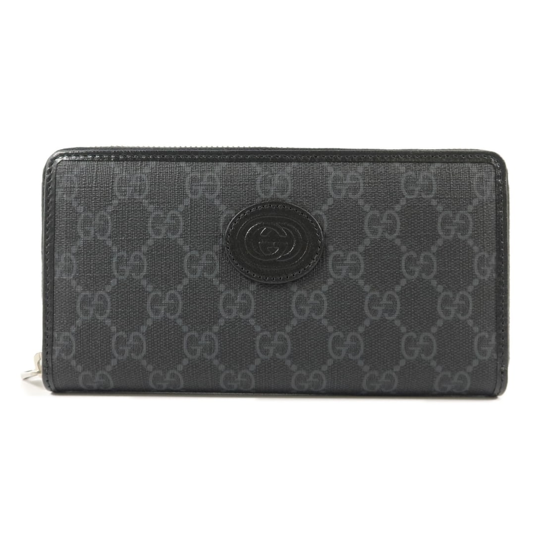 GUCCI 673003 Interlocking G zip wallet black coated canvas: GUCCI 673003 Interlocking G zip wallet black coated canvas A Gucci long round wallet featuring the Interlocking G design with SHW. It is made of PVC coated canvas in black, and comes with a storage bo