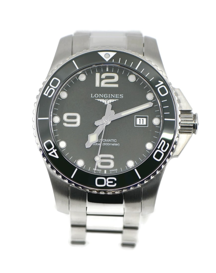 Longines Conquest Automatic Green Dial Steel Bracelet Watch L37824066: Longines Conquest Automatic Green Dial Steel Bracelet Watch L37824066 This Longines Conquest wristwatch features a 43mm stainless steel case with a smooth green bezel and matching green dial. The watc