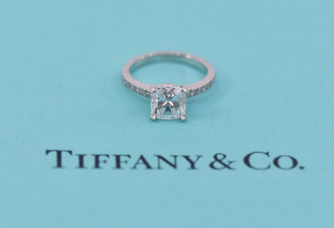 Tiffany & Co Novo 1.66 CTW Diamond Platinum Ring Size 4.25: Tiffany & Co Novo 1.66 CTW Diamond Platinum Ring Size 4.25 This exquisite Tiffany & Co. Novo Diamond Ring is crafted from high-quality platinum with a metal purity of 950. Designed in a size 4.25, thi
