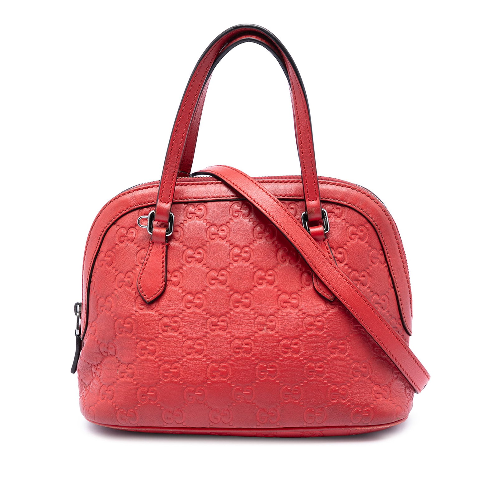 Gucci Red Leather Mini Guccissima Dome Satchel: Gucci Red Leather Mini Guccissima Dome Satchel This Mini Guccissima Dome Satchel is crafted from red leather and features flat leather handles, a detachable flat strap, a top zip closure, and an inter