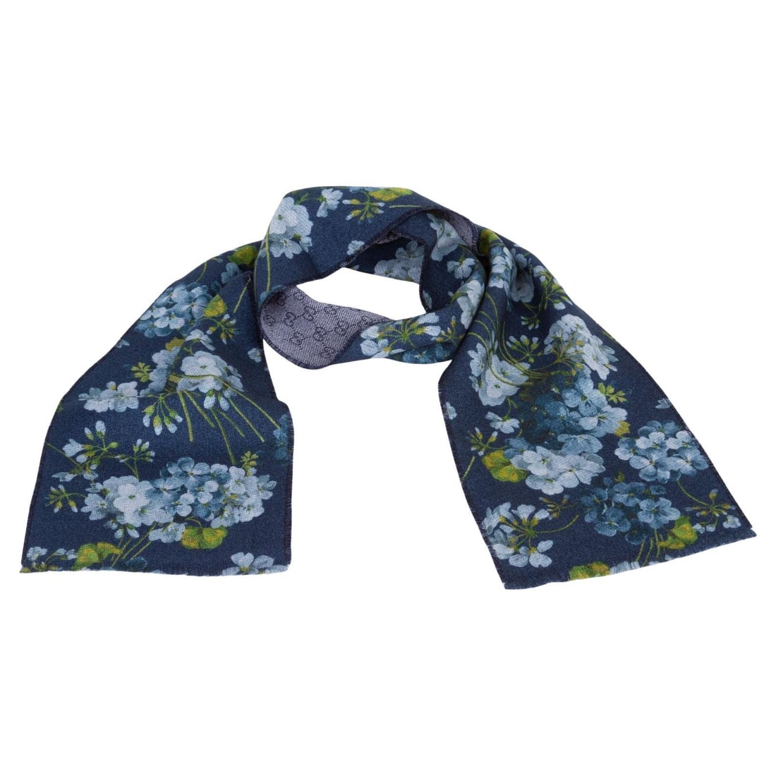 Gucci Reversible GG Wool Scarf New Blooms Italy 21st Century: Gucci Reversible GG Wool Scarf New Blooms Italy 21st Century Elevate your accessory game with this Gucci New Blooms Reversible GG Wool Scarf. Crafted from 100% wool, this luxurious scarf features a st