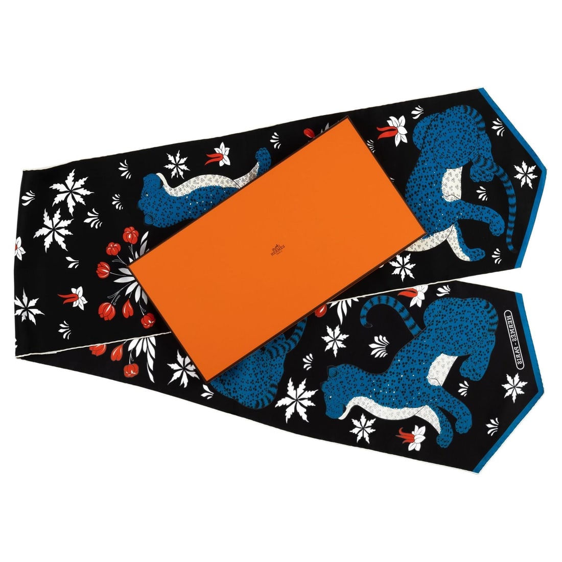 Hermes Black Guepards Silk Stole 70 in New in Box: Hermes Black Guepards Silk Stole 70 in New in Box This exquisite Hermes black Guepards silk stole is a luxurious addition to any wardrobe. Crafted in France, this designer stole features a striking gu