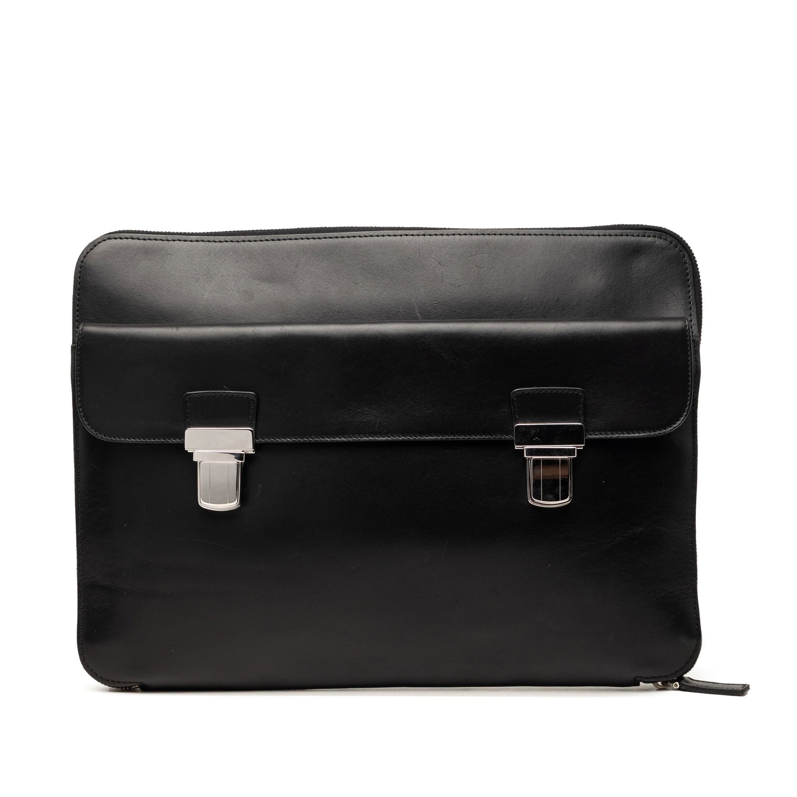 Saint Laurent black leather zip around clutch bag: Saint Laurent black leather zip around clutch bag This Saint Laurent clutch features a black leather body with a zip-around closure and an exterior flap pocket secured by push lock closures. The inter