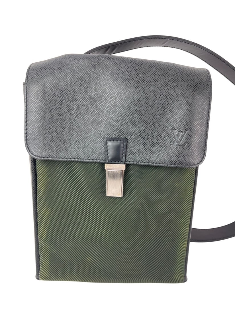 Louis Vuitton Saratov PM Taiga crossbody bag Ardoise: Louis Vuitton Saratov PM Taiga crossbody bag Ardoise This Louis Vuitton Taiga Saratov PM Vintage Crossbody Bag features a rectangular shape and a sophisticated ardoise green exterior crafted from canv