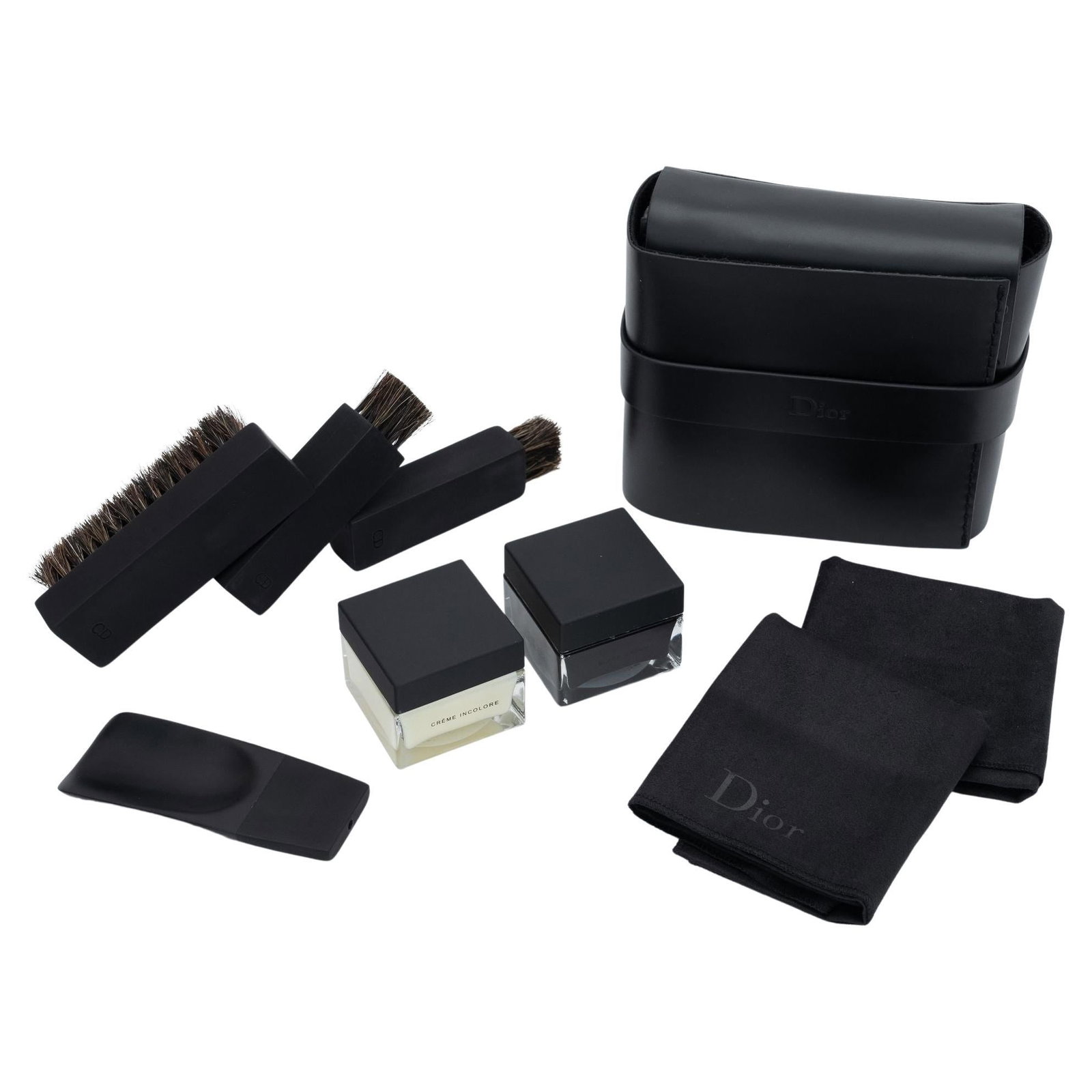 Christian Dior Black Leather Travel Shoe Care Kit with Brushes and Cream: Christian Dior Black Leather Travel Shoe Care Kit with Brushes and Cream This exquisite travel shoe kit from Christian Dior is crafted from luxurious black leather, making it a stylish companion for t