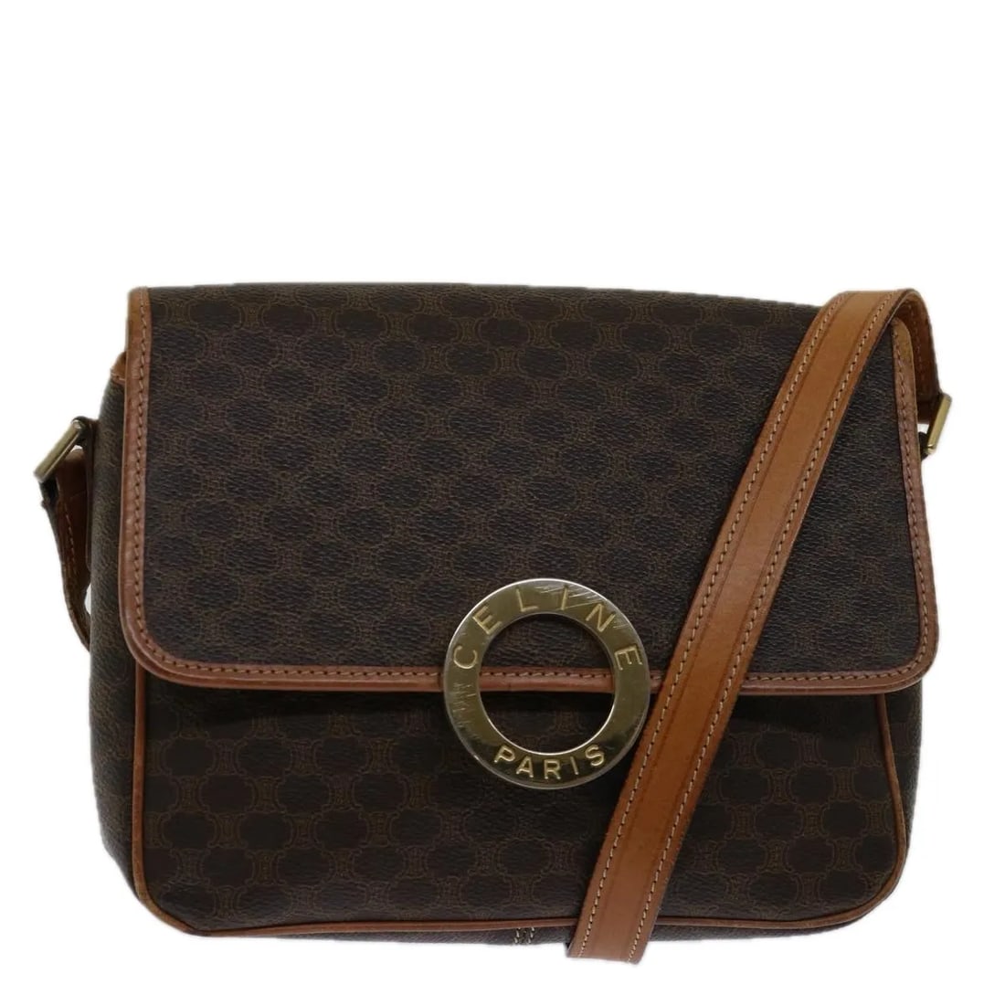Celine Circle Logo Brown PVC Shoulder Bag Italy: Celine Circle Logo Brown PVC Shoulder Bag Italy This Celine Circle Logo Shoulder Bag is crafted from brown PVC and designed for women. It features a classic shoulder strap and showcases the iconic cir