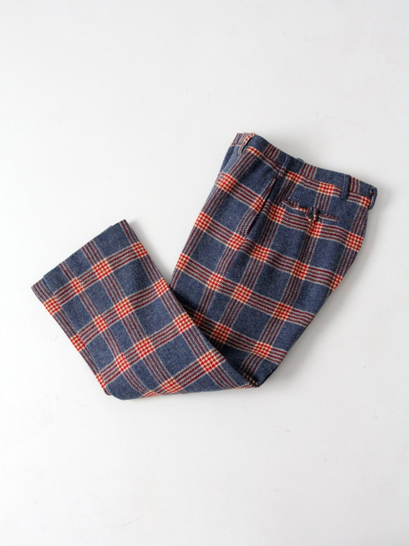 1950s Vintage Blue Plaid Wool Pants with Back Pockets: 1950s Vintage Blue Plaid Wool Pants with Back Pockets Discover a pair of vintage 1950s plaid wool pants, perfectly embodying classic style. Crafted from soft, thick wool, these pants feature a comfort