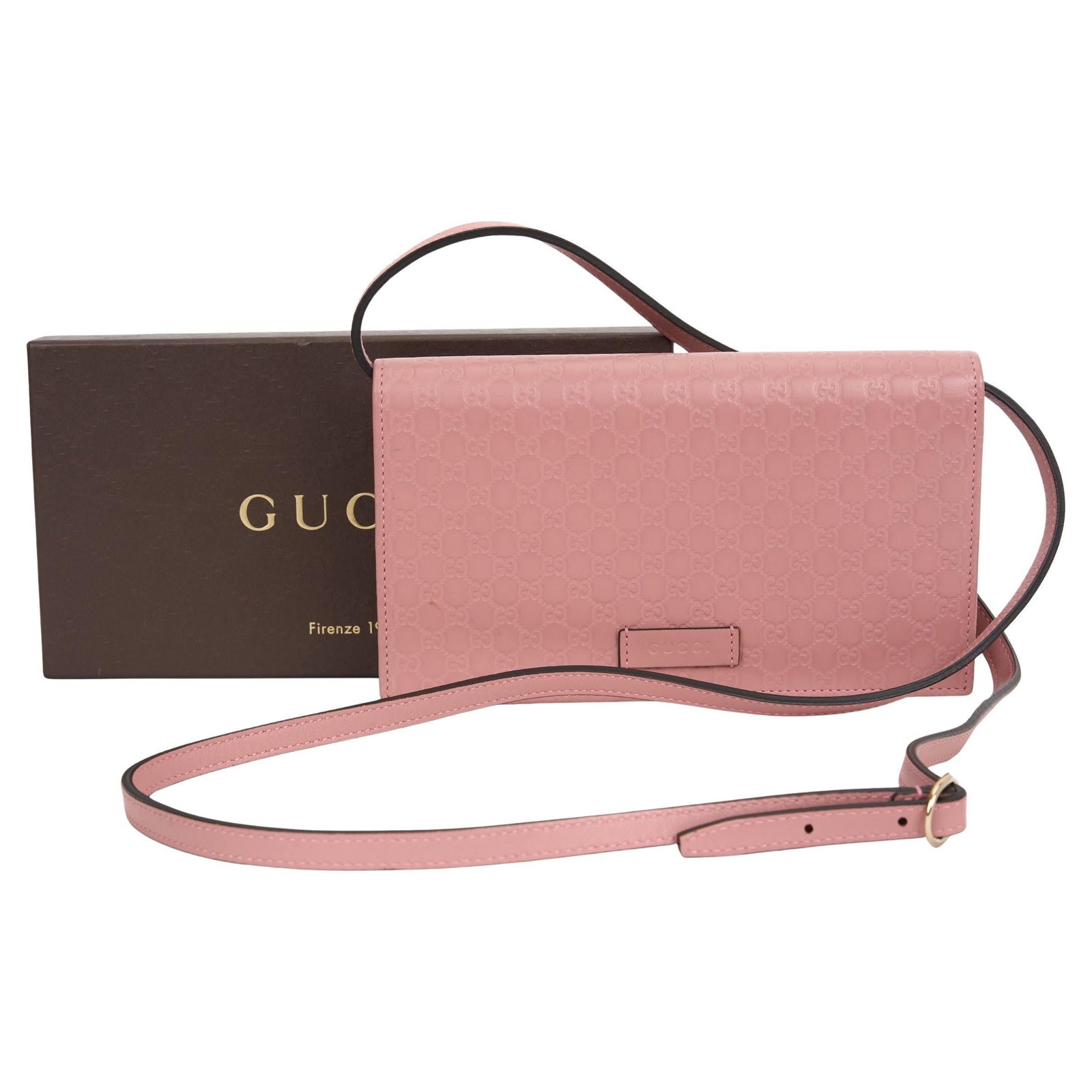 Gucci Pink Microguccissima Crossbody Bag with Gold Hardware: Gucci Pink Microguccissima Crossbody Bag with Gold Hardware Introducing the elegant Gucci Pink Guccissima Cross Body Bag, a versatile accessory that effortlessly combines style and functionality. Craf