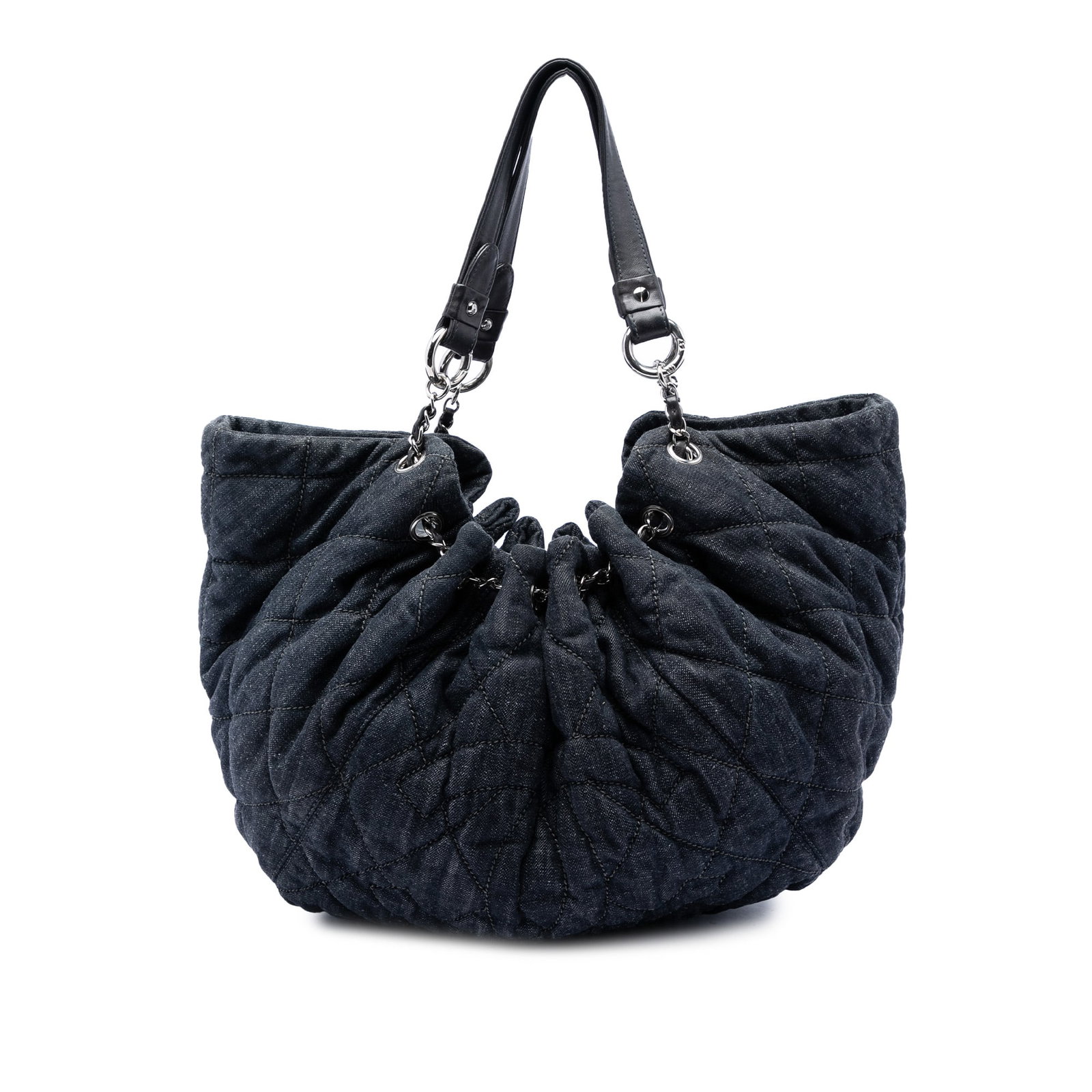 Chanel Stretch Spirit Cabas Quilted Denim Tote Bag Blue: Chanel Stretch Spirit Cabas Quilted Denim Tote Bag Blue The Chanel Quilted Denim Stretch Spirit Cabas Tote is a blue tote bag made with a denim body and fabric material. It features flat straps with s
