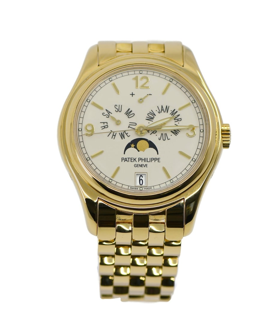 Patek Philippe Annual Calendar 18K Yellow Gold Watch 5146/1J-001 with Box and Papers: Patek Philippe Annual Calendar 18K Yellow Gold Watch 5146/1J-001 with Box and Papers This exquisite Patek Philippe Annual Calendar wristwatch showcases a luxurious 18K yellow gold case with a diameter