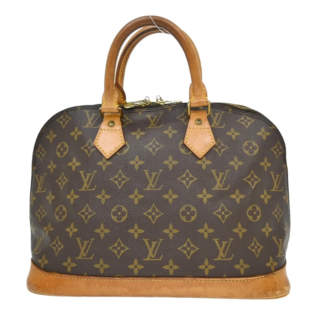 Louis Vuitton Alma handbag in brown monogram canvas: Louis Vuitton Alma handbag in brown monogram canvas Louis Vuitton Alma handbag in brown Monogram canvas. This structured top-handle bag is made in France and is presented in fair condition with visibl