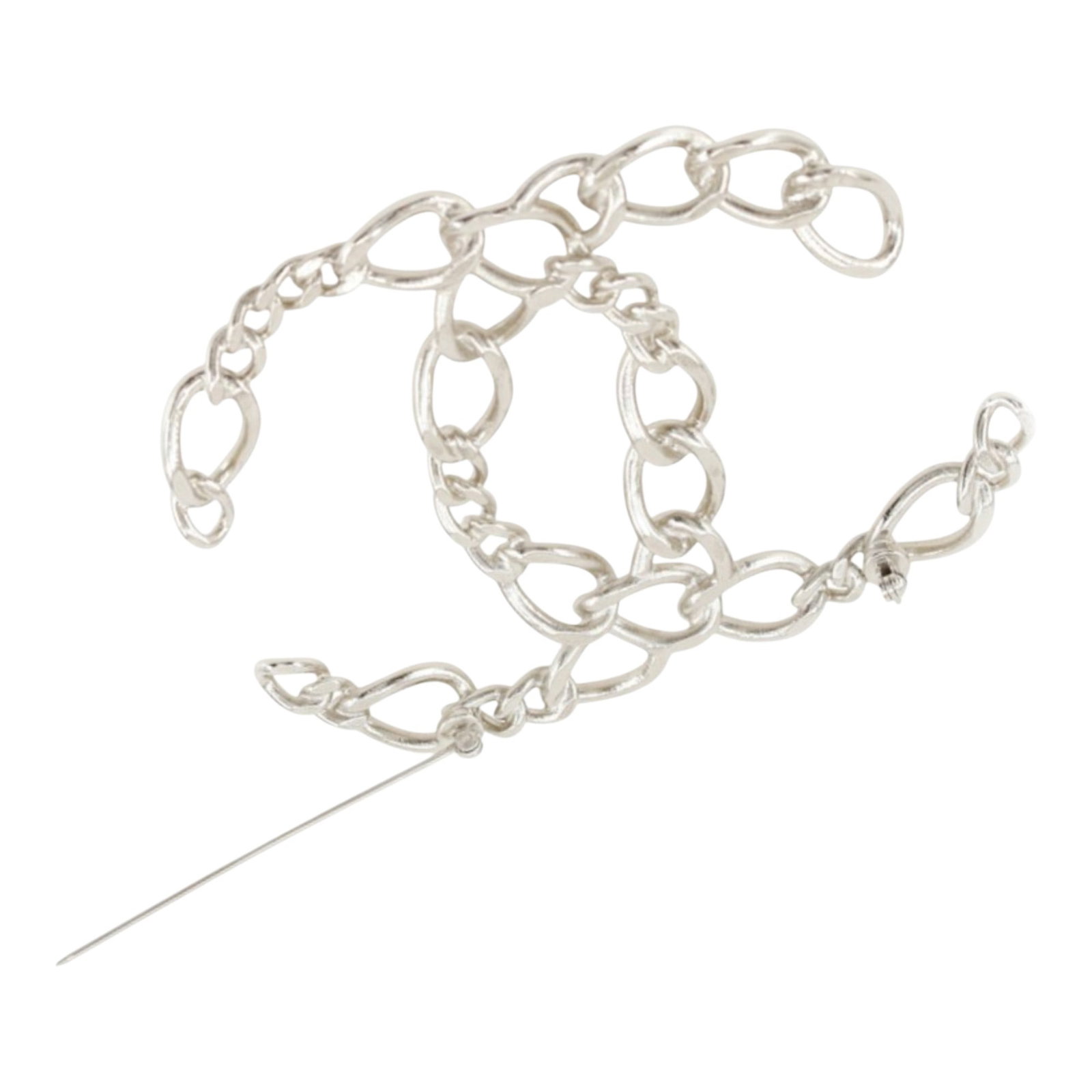 Chanel CC Openwork Chain Brooch in Silver Tone Metal: Chanel CC Openwork Chain Brooch in Silver Tone Metal Chanel CC openwork chain brooch in silver-tone metal with a back pin closure. This costume jewelry piece is made in France. Condition is B+ with sc