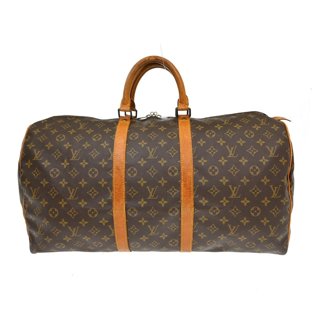 Louis Vuitton Keepall 55 Monogram Canvas Duffle Bag M41424: Louis Vuitton Keepall 55 Monogram Canvas Duffle Bag M41424 Vintage Louis Vuitton Keepall 55 travel handbag in Monogram canvas with leather trim and double handles. This extra-large duffle-style bag fe