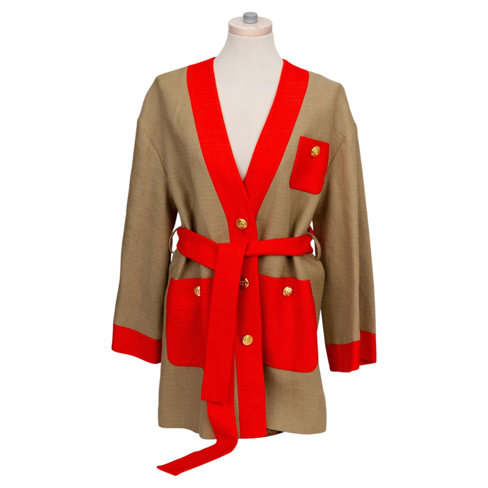 Gucci Linen Canvas Belted Jacket with Tag Size 40: Gucci Linen Canvas Belted Jacket with Tag Size 40 This Gucci linen beige canvas jacket features orange piping and gold details, offering a loose fit and a belted design. The jacket is un-used, comes w