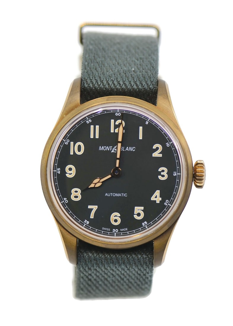 Montblanc 1858 Bronze Automatic Men's Wristwatch 118222: Montblanc 1858 Bronze Automatic Men's Wristwatch 118222 This Montblanc 1858 Collection wristwatch features a 40mm bronze case paired with a green analog dial and a fabric band. Powered by a mechanical