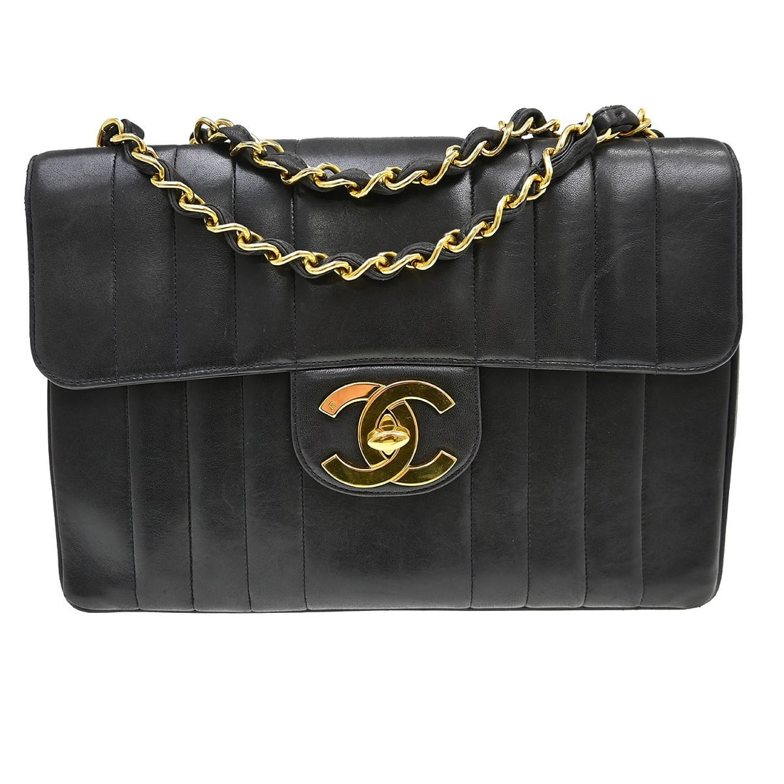 CHANEL Classic Flap Jumbo Shoulder Bag Black Lambskin Mademoiselle: CHANEL Classic Flap Jumbo Shoulder Bag Black Lambskin Mademoiselle Chanel Black Lambskin Jumbo Vertical Stitch Classic Flap Bag in a large shoulder bag style with a flap turnlock closure. It features 