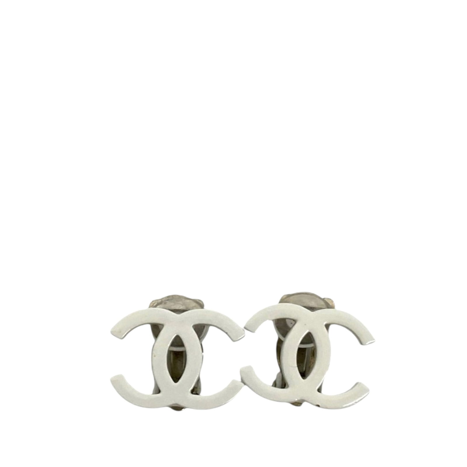 Chanel Lacquered CC Silver Plated Clip On Earrings: Chanel Lacquered CC Silver Plated Clip On Earrings These Chanel earrings feature lacquered silver-plated metal with a clip-on closure. Designed in a classic CC style, they are made in France and come 