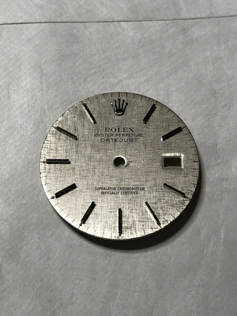 Rolex Datejust 36mm Silver Linen Watch Dial 16233 16013 Luxury: Rolex Datejust 36mm Silver Linen Watch Dial 16233 16013 Luxury This Rolex Datejust watch dial features a stunning silver linen texture complemented by silver tone indices. Designed for the iconic Role