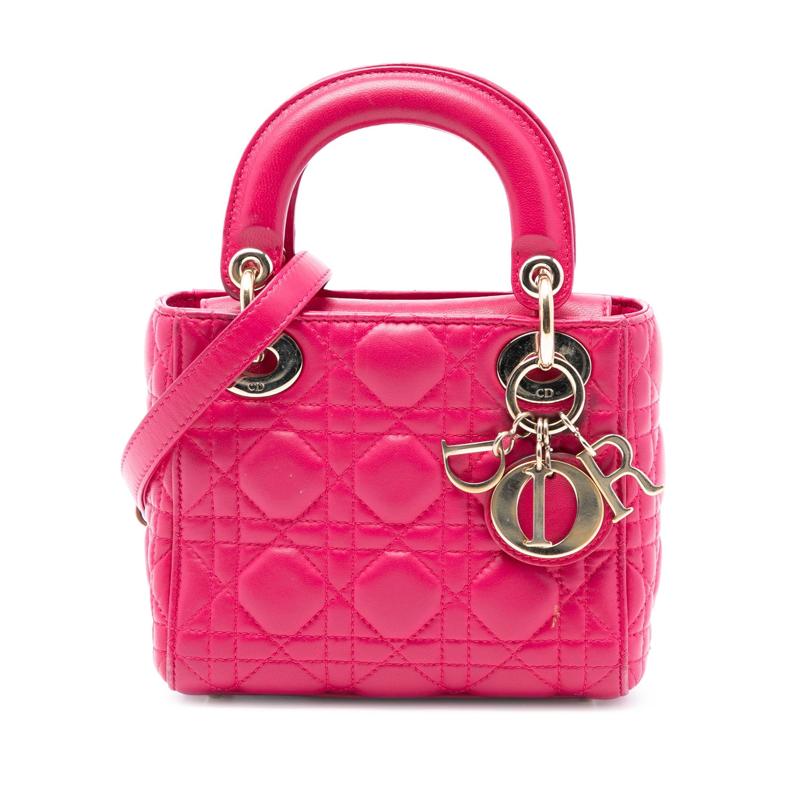 Dior Pink Mini Lady Dior Lambskin Cannage Bag: Dior Pink Mini Lady Dior Lambskin Cannage Bag This Mini Lady Dior handbag features a quilted lambskin leather body in pink, complemented by flat leather top handles and a detachable flat leather shoul