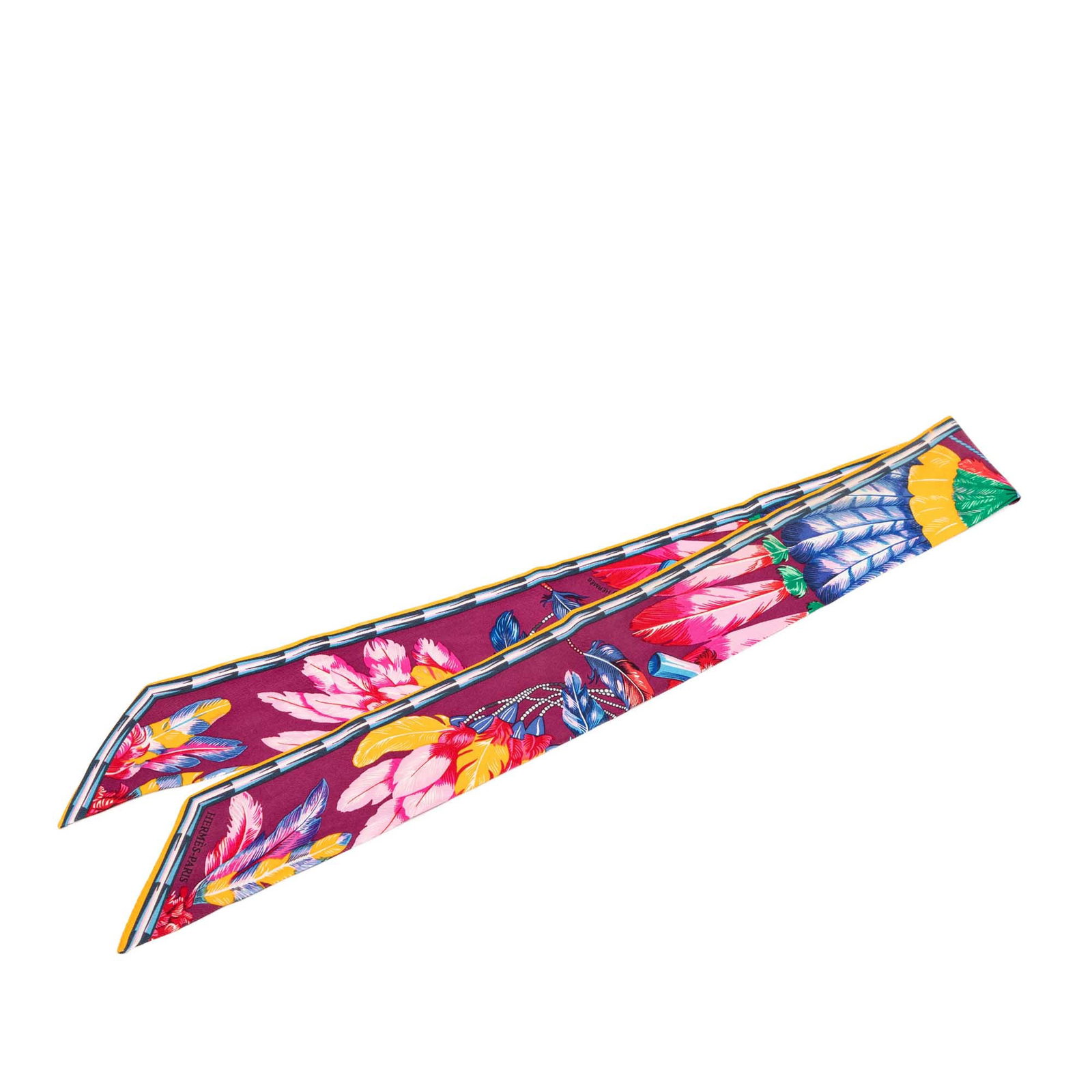 Hermes Brazil Feather Twilly Scarf Purple Silk: Hermes Brazil Feather Twilly Scarf Purple Silk Hermes Brazil Feather Silk Twilly Scarf in purple with a Brazil Feather print. Made in France from 100% silk, this accessory is presented as a twilly sca