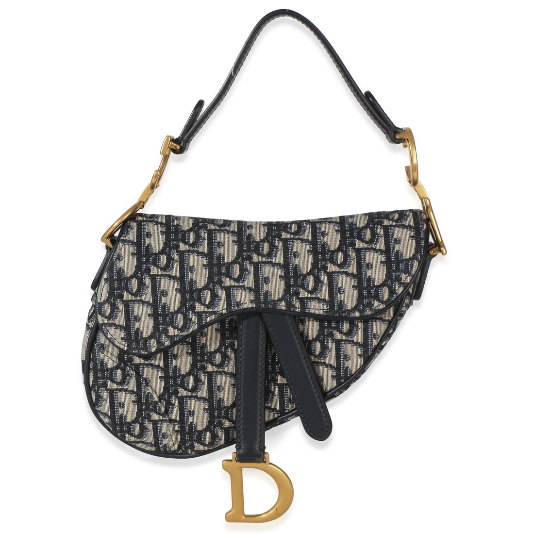 Christian Dior Mini Saddle Bag Navy Oblique Canvas: Christian Dior Mini Saddle Bag Navy Oblique Canvas This Christian Dior Mini Saddle Bag features the iconic navy Oblique canvas design in beige and blue tones. Crafted in Italy, the bag offers both sho