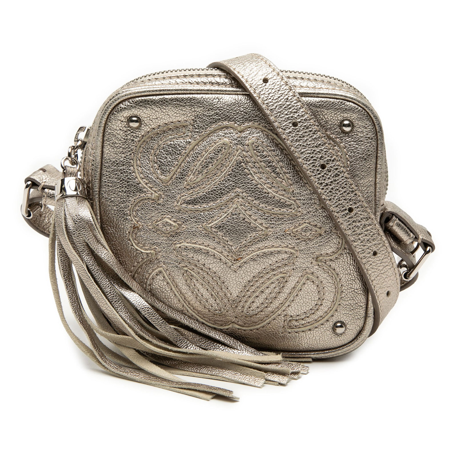 Silver Mini Anagram Crossbody Bag with Tassel by Loewe: Silver Mini Anagram Crossbody Bag with Tassel by Loewe This LOEWE Mini Metallic Goatskin Anagram Tassel Crossbody bag features a metallic goatskin leather exterior in silver, an adjustable flat leathe