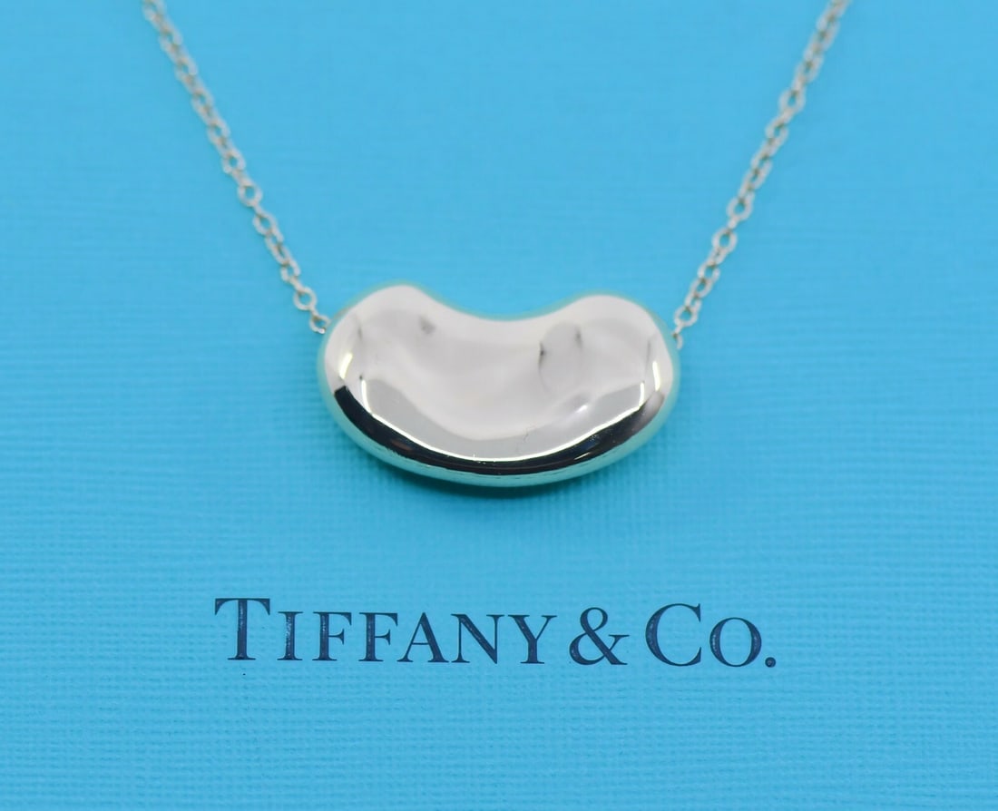 Tiffany & Co Elsa Peretti Bean Pendant Necklace 18K Yellow Gold 30 Inches: Tiffany & Co Elsa Peretti Bean Pendant Necklace 18K Yellow Gold 30 Inches An Elsa Peretti bean pendant necklace by Tiffany & Co., crafted in 18K yellow gold. The necklace features a pendant-style desi