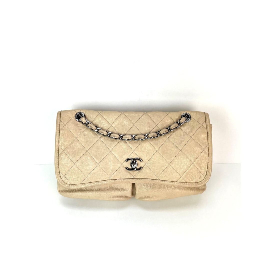 Chanel Medium Natural Beauty Beige Quilted Flap Bag: Chanel Medium Natural Beauty Beige Quilted Flap Bag This Chanel Grained Leather Medium Natural Beauty Flap Bag combines elegance with functionality. Crafted from high-quality leather, its exterior fea