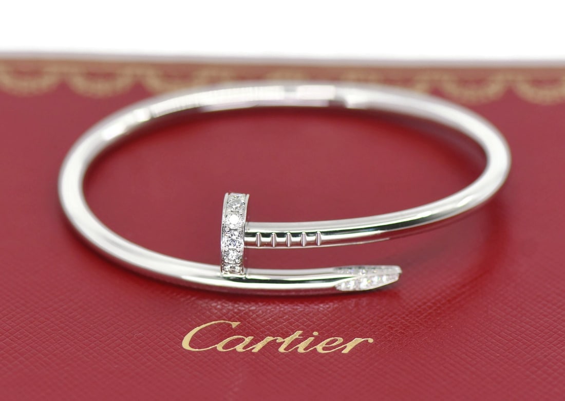 Cartier Juste un Clou 18K White Gold Diamond Bangle Size 16: Cartier Juste un Clou 18K White Gold Diamond Bangle Size 16 This Cartier Juste Un Clou bracelet features an elegant bangle design crafted from 18K white gold and adorned with diamonds. Part of the ren