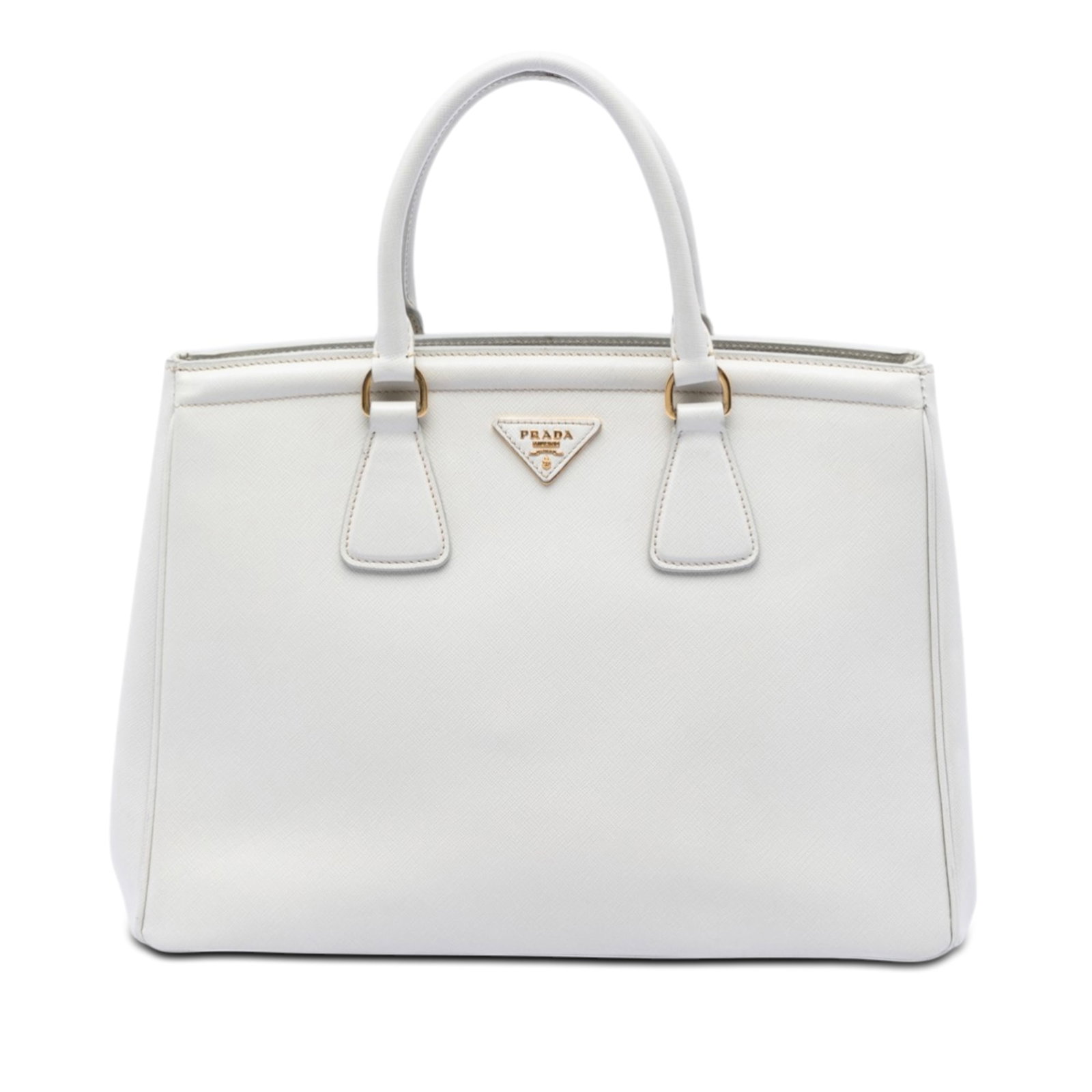 Prada Parabole Tote in White Saffiano Lux Leather: Prada Parabole Tote in White Saffiano Lux Leather Prada Saffiano Lux Parabole Tote in white leather. This tote features rolled leather handles, an open top with side magnetic snap button closures, and