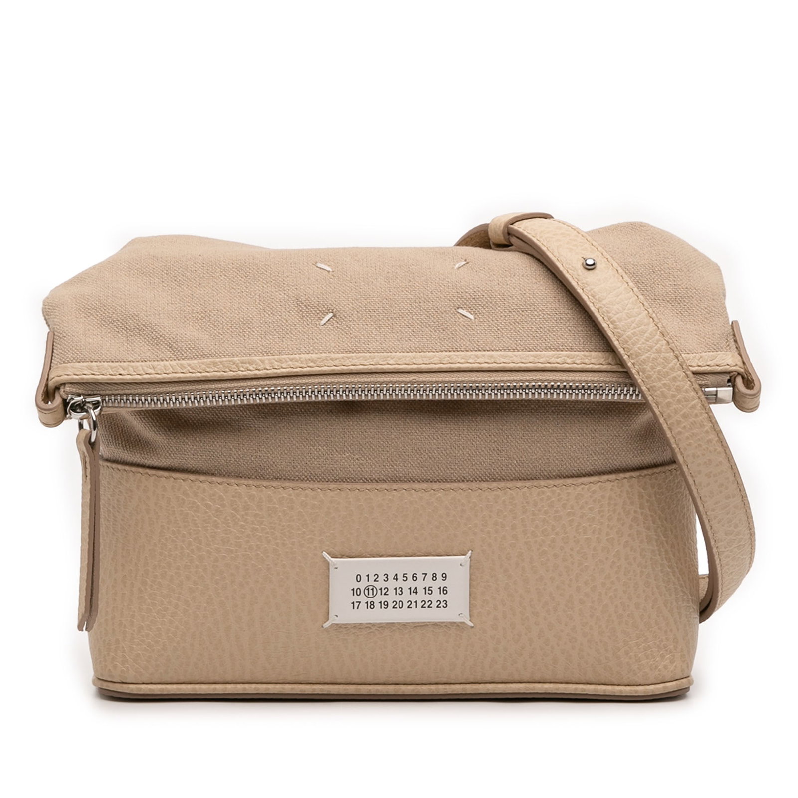 Maison Margiela 5AC Small Foldable Crossbody in Canvas and Calfskin: Maison Margiela 5AC Small Foldable Crossbody in Canvas and Calfskin Maison Margiela 5AC foldable crossbody bag crafted with a canvas body and grained calfskin leather trim. This small crossbody featur