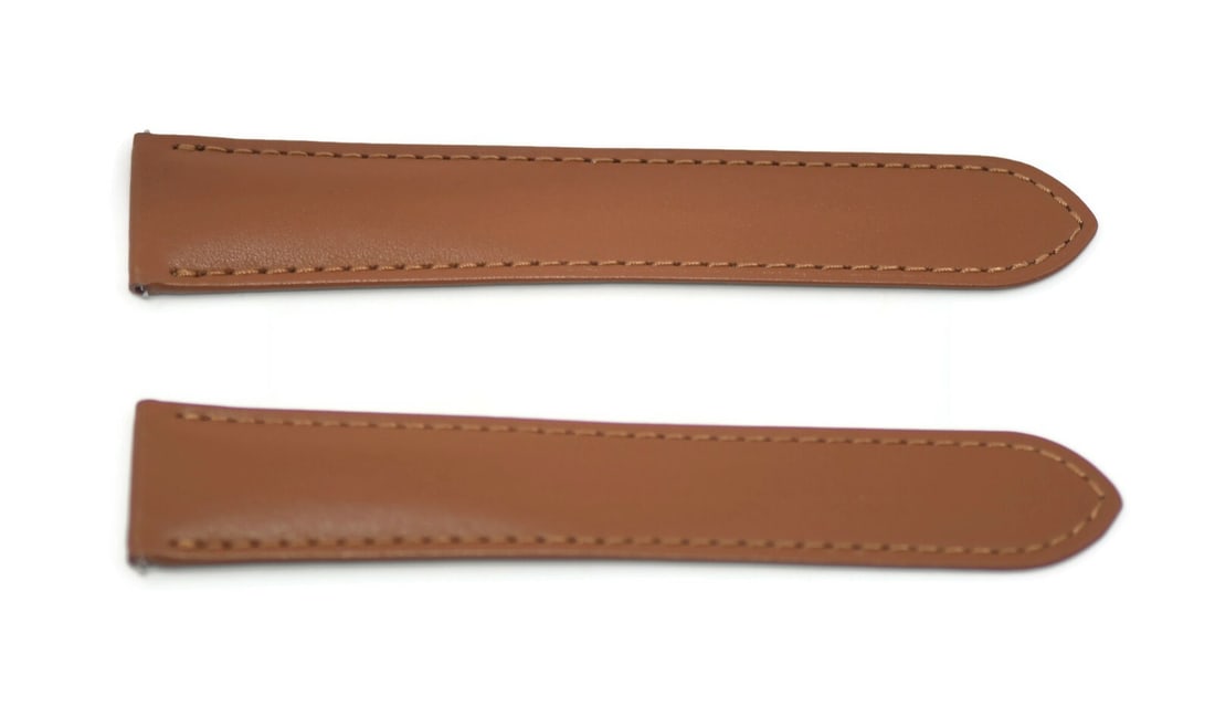 Cartier Authentic Brown Leather Wristwatch Band 21mm: Cartier Authentic Brown Leather Wristwatch Band 21mm This authentic Cartier brown leather wristwatch band features a classic design that complements a variety of timepieces. Crafted from high-quality 
